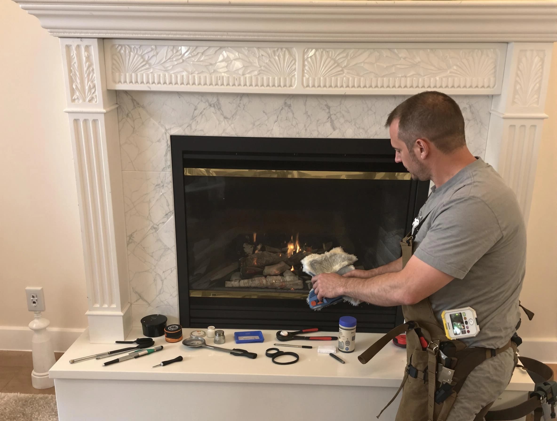 Tewksbury Chimney Sweep performing fireplace maintenance in Tewksbury, MA